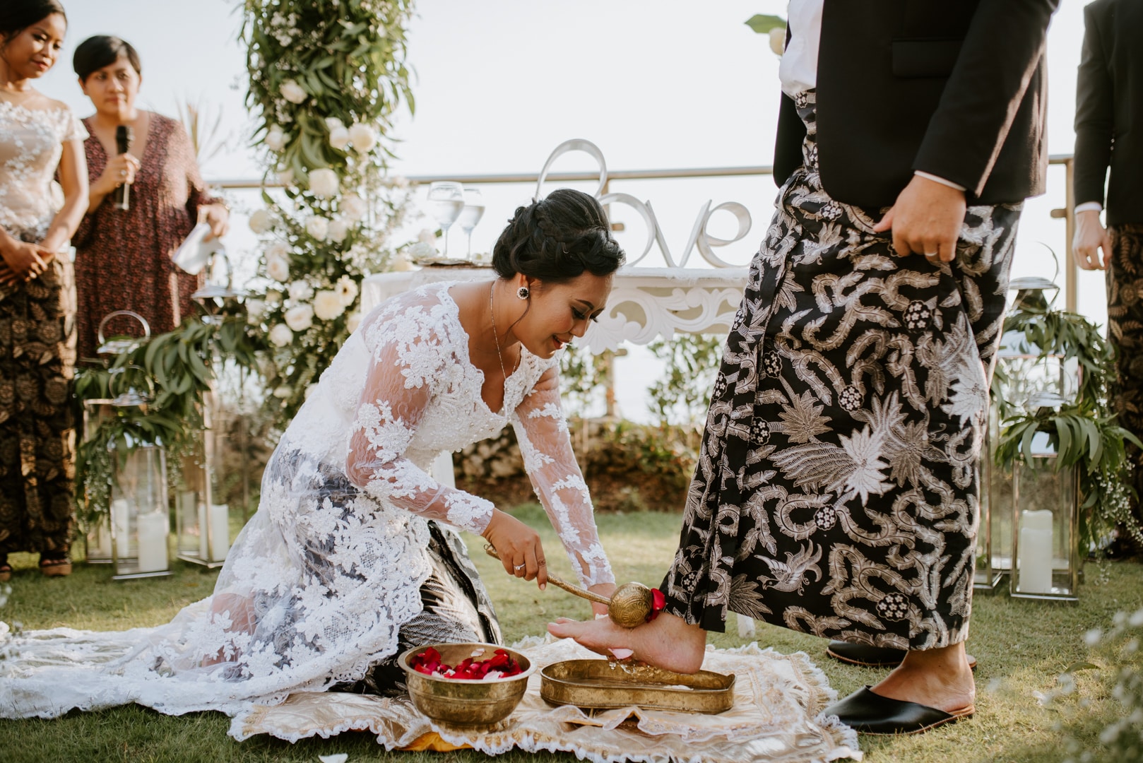 Foot washing ritual Javanese wedding Bali